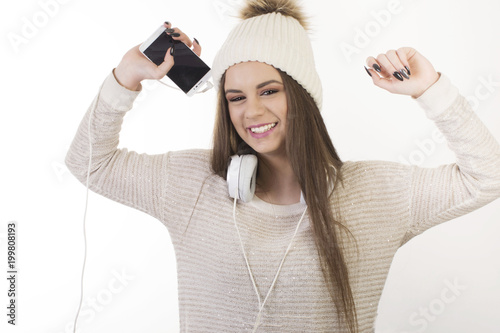 A young girl with headphones