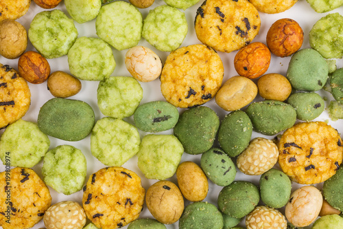 background of wasabi rice cracker with coated peanuts
