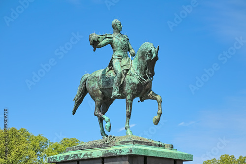 Equestrian statue of William II of the Netherlands on the Buitenhof square in The Hague. The statue was erected in 1924. This is a replica of the statue in Luxembourg from 1884. photo