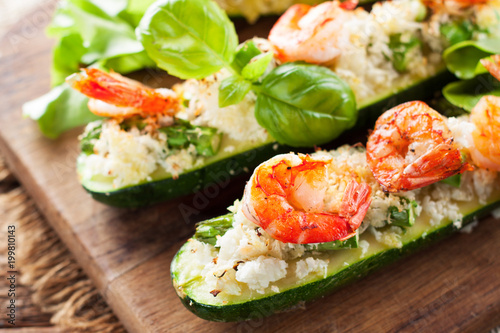 Grilled zucchini stuffed with shrimps and cauliflower rice