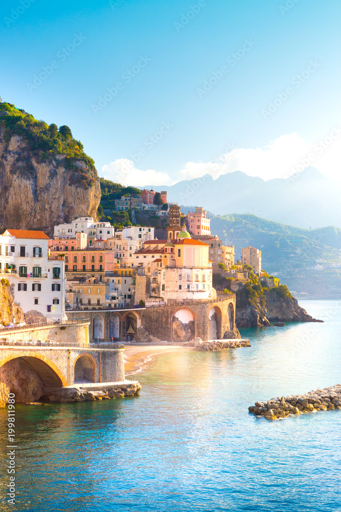 Morning view of Amalfi cityscape on coast line of mediterranean sea, Italy