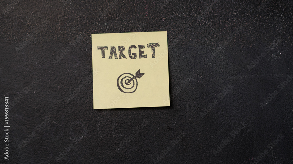 Sticky note with Target word on the blackboard Sticky note with Target word on the blackboard
