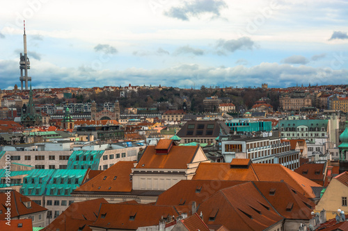 Panorama of the city of Prague. The old part of the city. Beautiful roofs of shingles. Ancient buildings and churches.