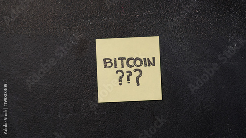 Sticky note with question Bitcoin??? on the blackboard