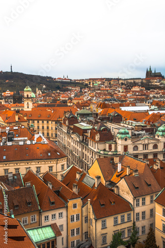 Panorama of the city of Prague. The old part of the city. Beautiful roofs of shingles. Ancient buildings and churches.