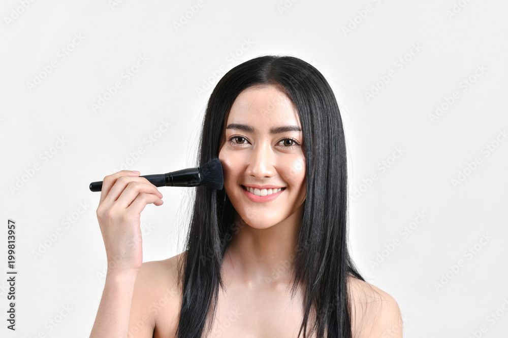 The concept of healthy beautiful woman. Beautiful girl Make up with cosmetics. Beautiful women use cosmetics suitable for the face. Beautiful woman makeup on isolated background The concept of healthy beautiful woman. Beautiful girl Make up with cosmetics. Beautiful women use cosmetics suitable for the face. Beautiful woman makeup on isolated background
