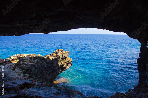 Sea cave near Cape Greko of Ayia Napa and Protaras on Cyprus island, Mediterranean Sea. photo