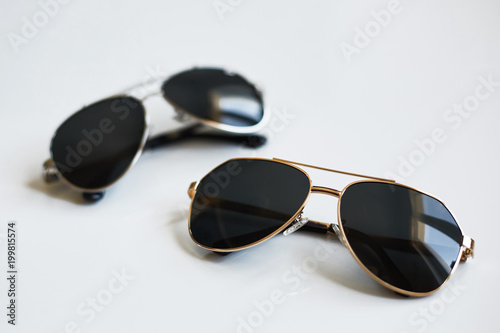 Stylish sunglasses pair isolated on white background