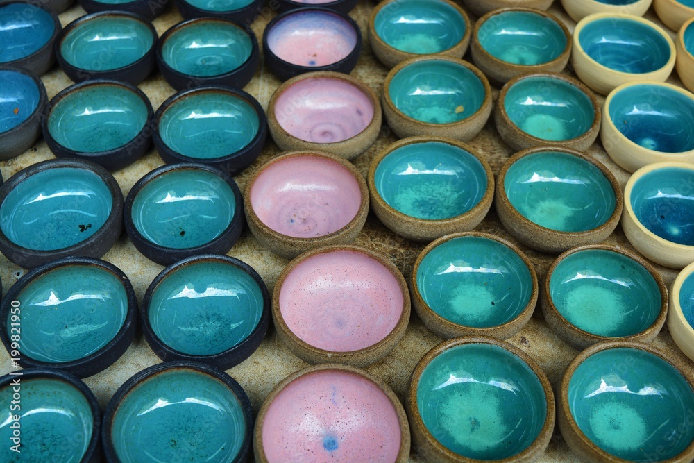Handmade pottery being sold on a market in Israel Handmade pottery being sold on a market in Israel