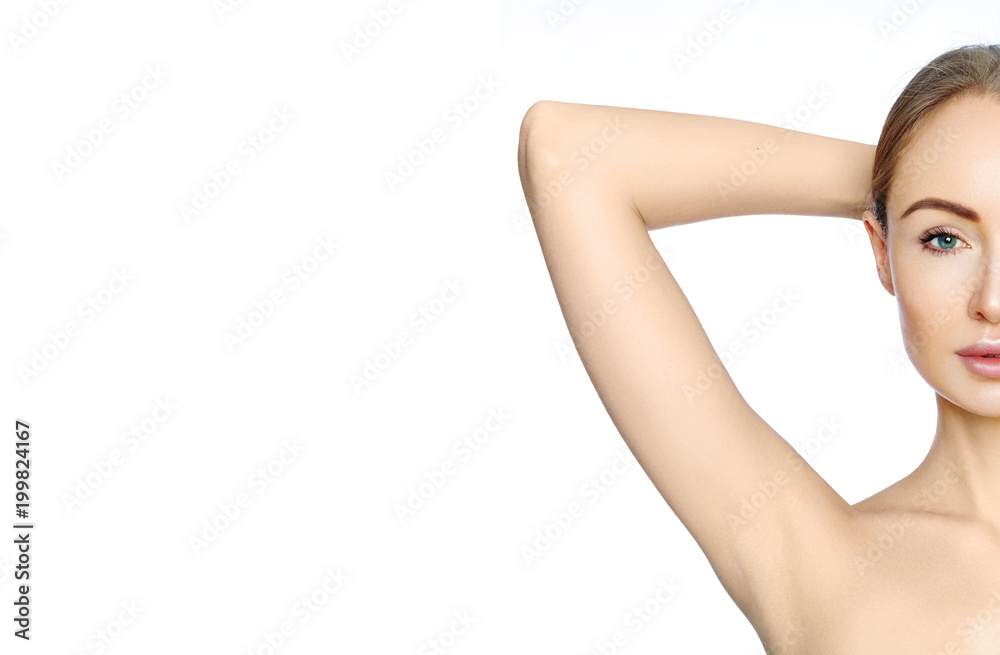 Obraz premium Beautiful woman holding her arms with clean underarms. Epilation