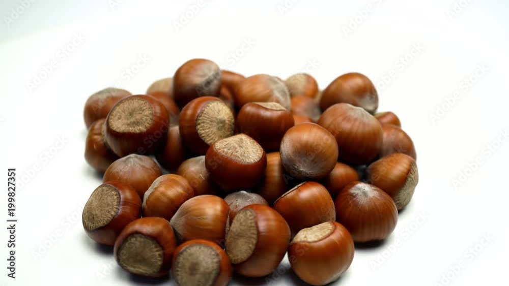 A pile of shelled hazelnuts rotating smoothly. 4K A pile of shelled hazelnuts rotating smoothly. 4K
