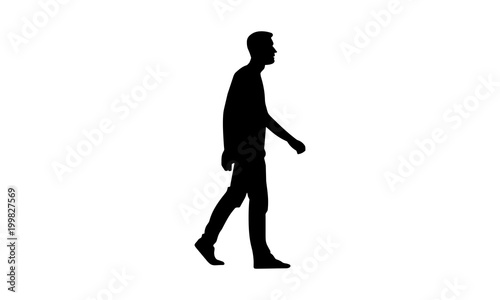 silhouette of a man walking