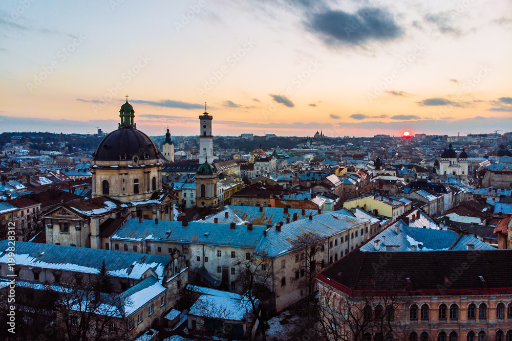 bird's eye view on old european town on sunset