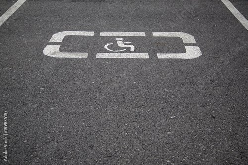 Handicap parking areas reserved for disabled people Horizontal background © Andy Shell
