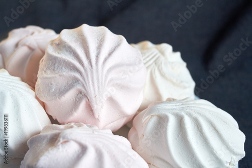 Wallpaper Mural white and pink zephyr close-up on a white plate Torontodigital.ca