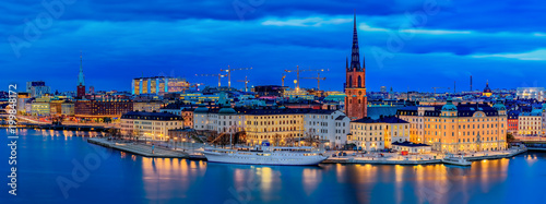 Panoramic sunset view onto Stockholm old town Gamla Stan and Riddarholmen church in Sweden