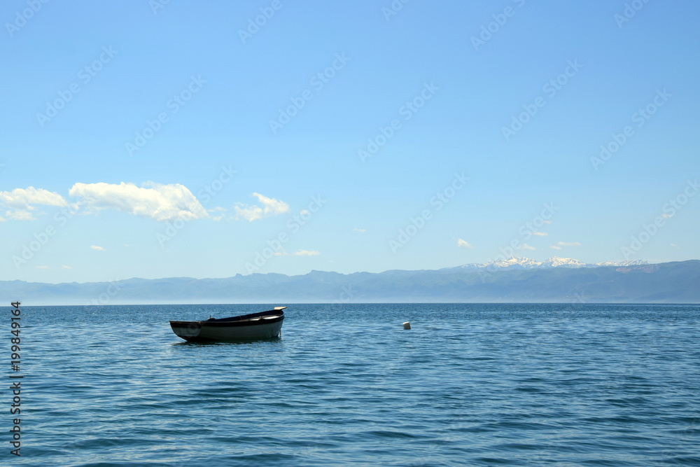 Boat moored in ohrid lake. Ohrid, Macedonia.