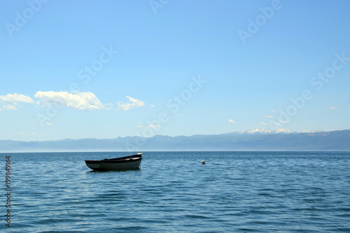 Boat moored in ohrid lake. Ohrid, Macedonia. © arkadiwna
