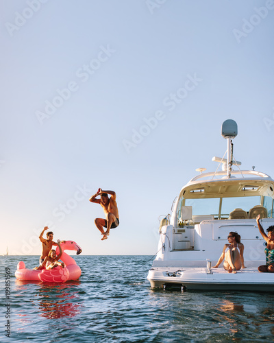 Photography Young people having fun during party on a private boat