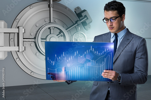 Businessman with touchscreen in financial banking concept