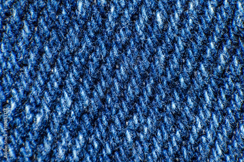 macro of blue fabric on the whole frame