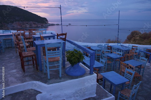 Traditional Greek taverna on the cliffs of Skopelos town  Skopelos island in Greece