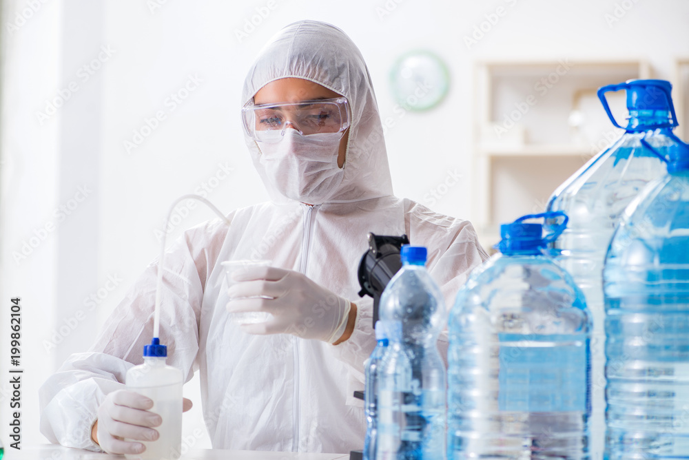 Lab assistant testing water quality Lab assistant testing water quality