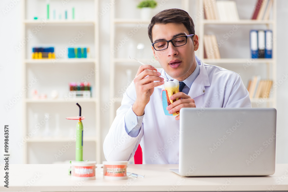 Young dentist working in the dentistry hospital Young dentist working in the dentistry hospital