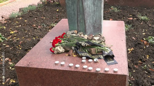 Flowers at the Monument to the Victims of the Chisinau Ghetto, Moldova photo