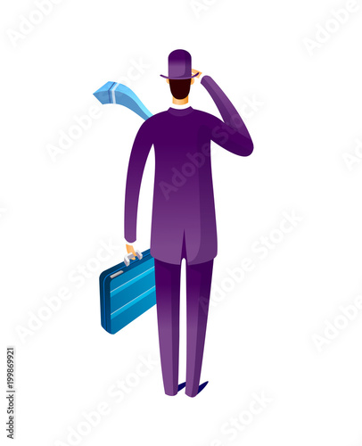 Rear view of man standing with suitcase