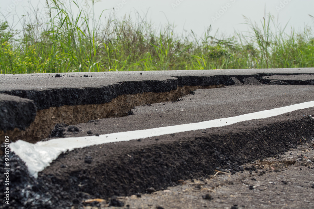 Asphalt surface on the street was demolished due to poor construction. Asphalt surface on the street was demolished due to poor construction.