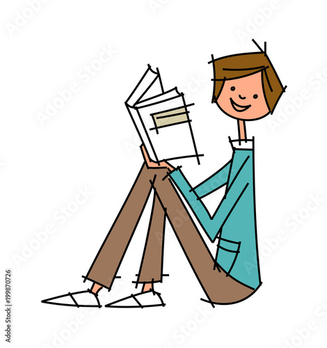 Close-up of boy holding book