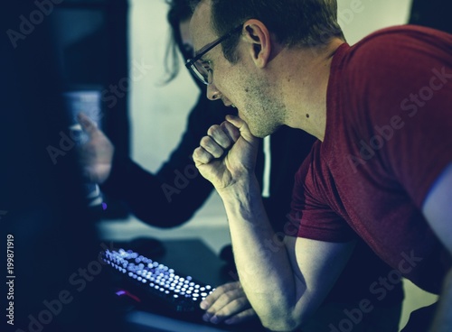 Programmers working on computer program