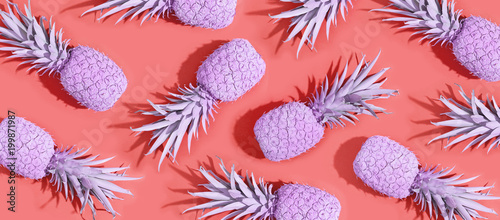 Painted pineapples on a vivid pink background