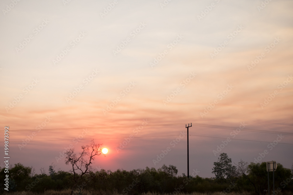 Smokey  sunset near Tenant Creek in the outback of the Northern Territory in Australia