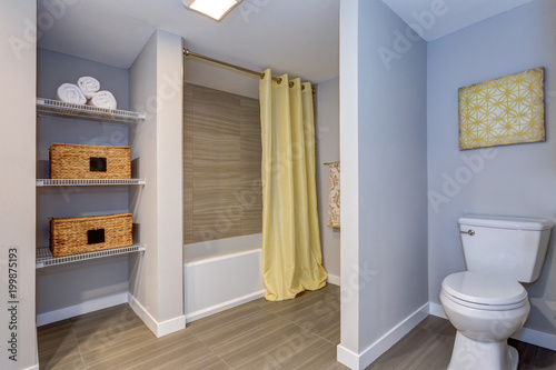 Elegant bathroom with built in shelves. © Javani LLC