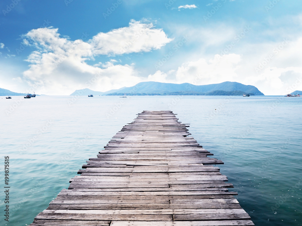 Fototapeta premium Old wooden bridge on the sea