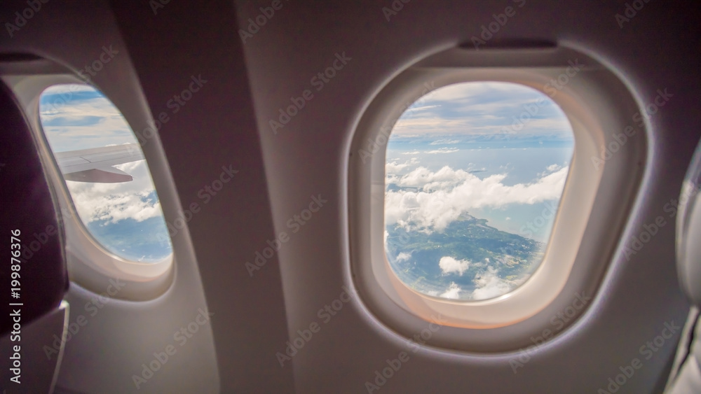 Airplane seat and window inside an aircraft. Airplane seat and window inside an aircraft.