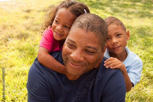 African American father and his children.