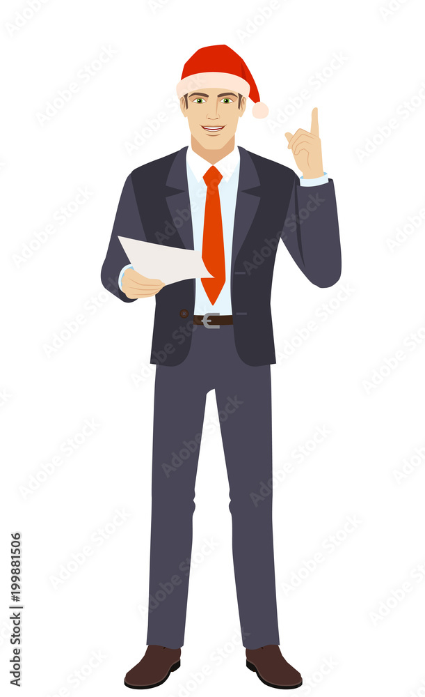 Businessman in Santa hat holding a paper and pointing up Businessman in Santa hat holding a paper and pointing up