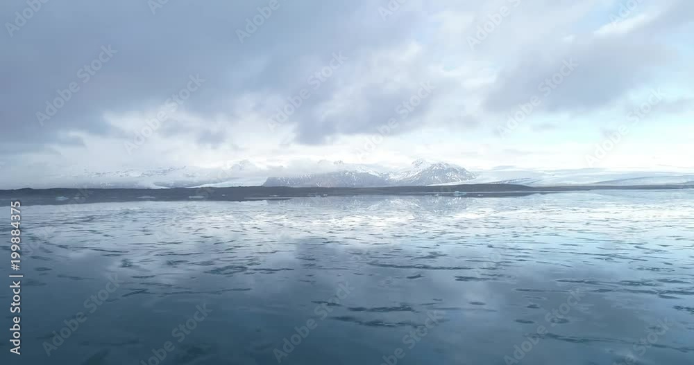 Mountains and ice lagoon Jokulsarlon in Iceland.Beautiful scenery. Mountains and ice lagoon Jokulsarlon in Iceland.Beautiful scenery.