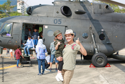 Photo Children’s day, Unidentified people and childrens taking photo with helicopters at Royal Thai Army Headquarters in Bangkok Thailand