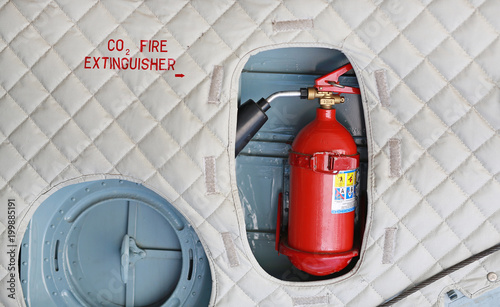 Fire Extinguisher installation in the military airplane.
