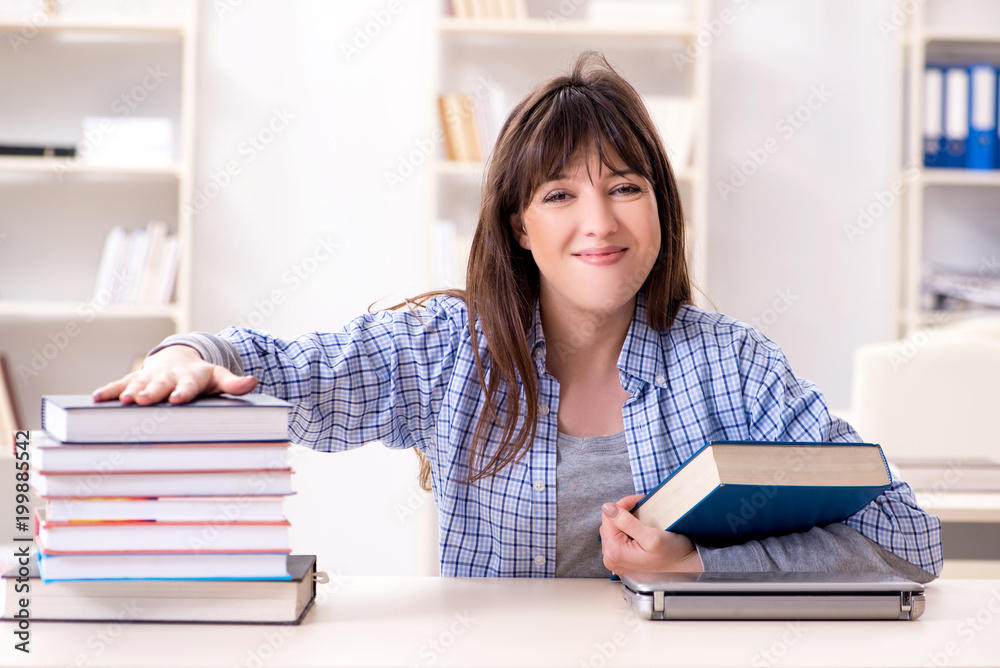 Young female student in educational concept Young female student in educational concept