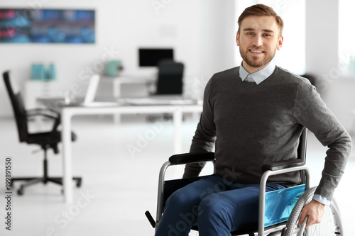Young man in wheelchair at ...