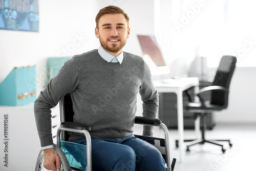 Young man in wheelchair at ...