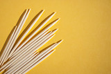 toothpicks. toothpick isolated on yellow background