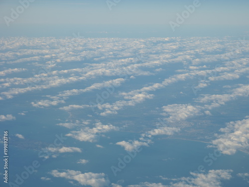 Beauty panoramic landscape of blue sky and cloud as seen through window of an aircraft above Europe