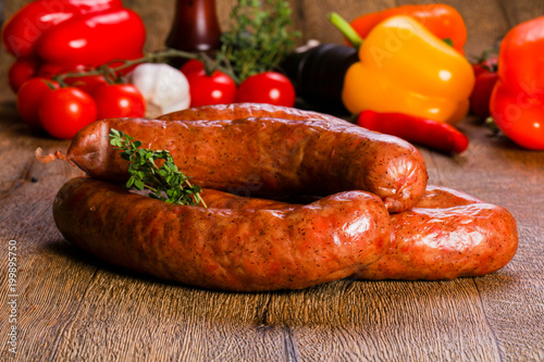 Pork sausages over wooden