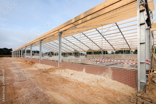 Foto Construction site. Building a new stable.